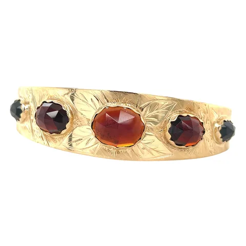 Vintage 14K Gold Bangle with Garnet