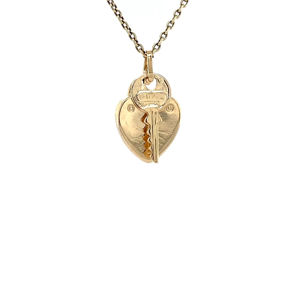 Vintage 14K Gold Heart Lock with Key Pendant