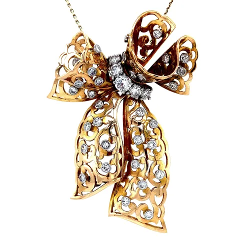 Vintage 14K Gold Bow Pendant with Diamond