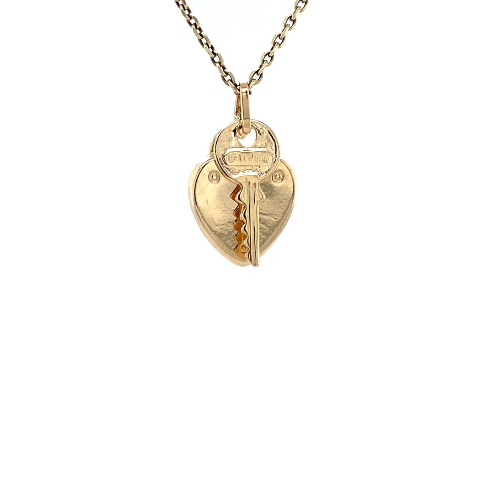 Vintage 14K Gold Heart Lock with Key Pendant